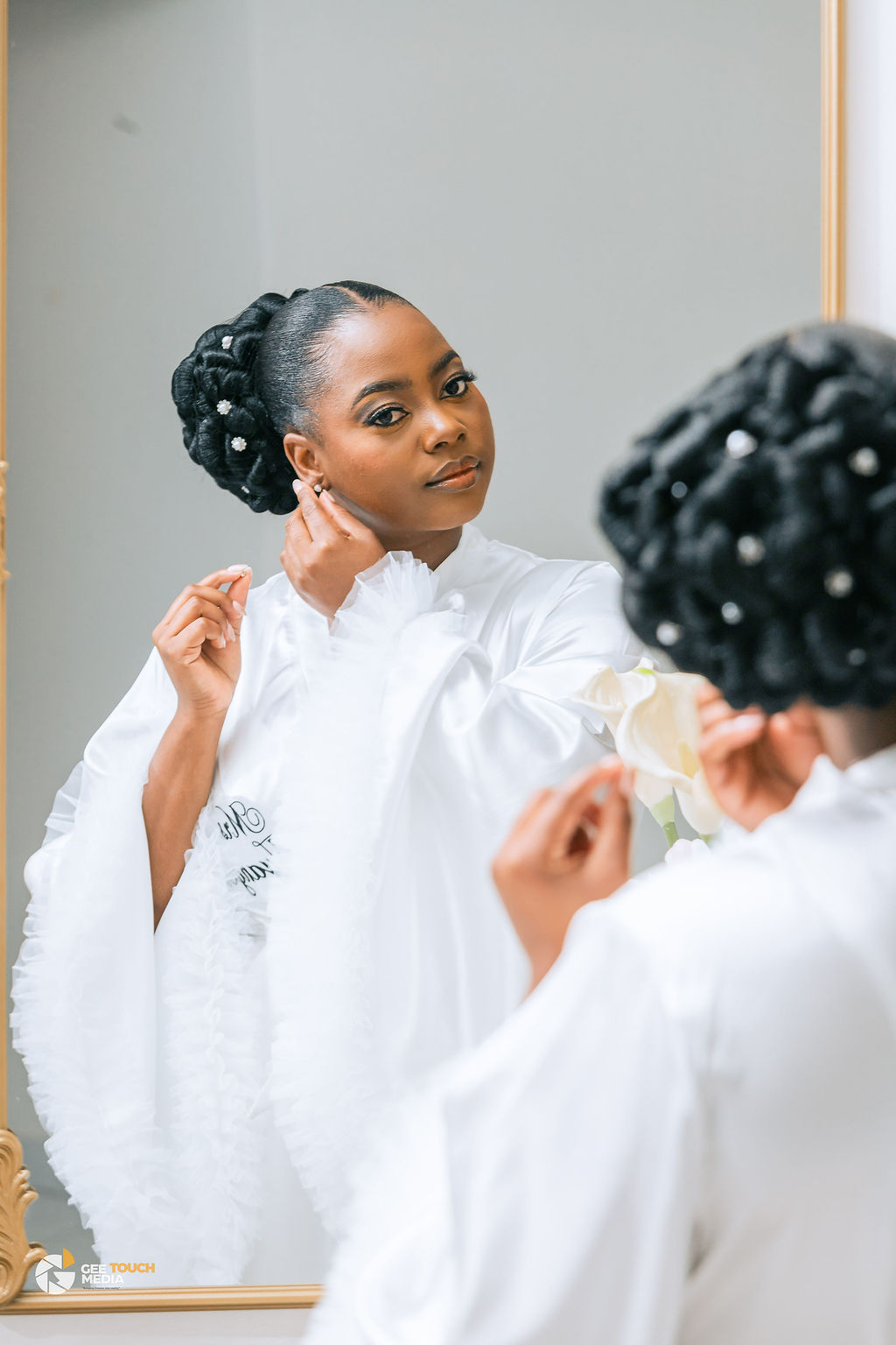 A bride doing her makeup